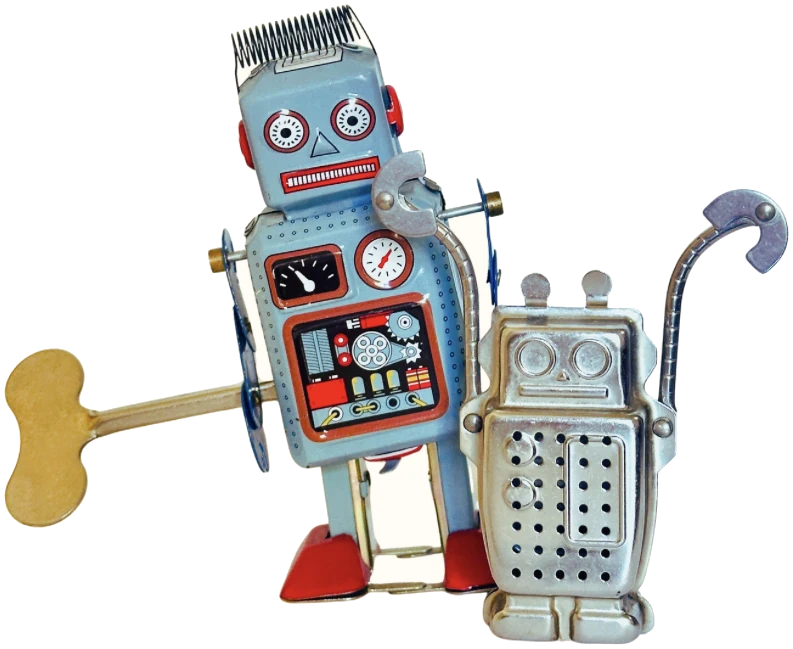 Kaksi vanhaa peltistä leikkirobottia vierekkäin